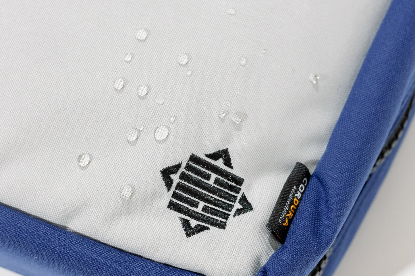 Water droplet on the water-resistant exterior of the bag. 