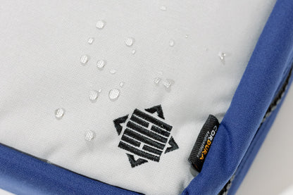 Water droplet on the water-resistant exterior of the bag. 